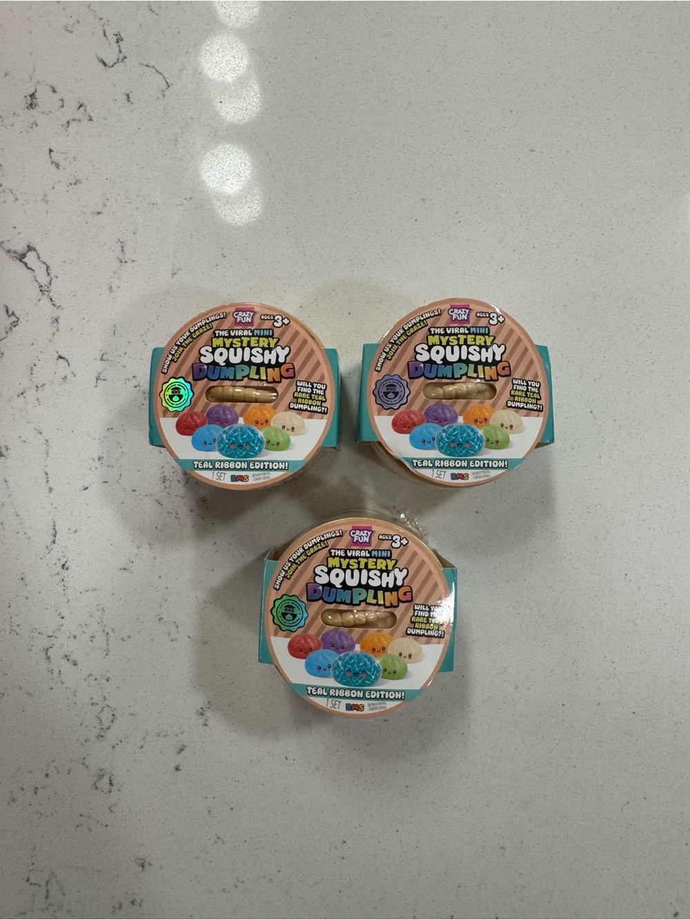 The viral MINI mystery squishy Dumpling teal ribbon edition Bundle ! Set of 3